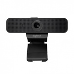 Webcam Logitech com design compacto e lente integrada.